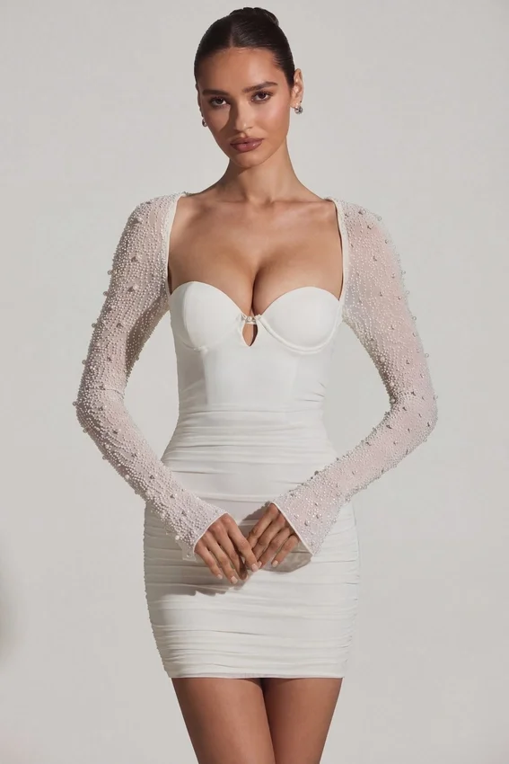 Vestido corto de manga larga con adornos St Germain en blanco Vestido corto de manga larga con adornos St Germain en blanco