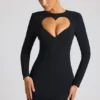 Vestido corto de manga larga con corte en forma de corazón Luciana en negro Vestido corto de manga larga con corte en forma de corazón Luciana en negro