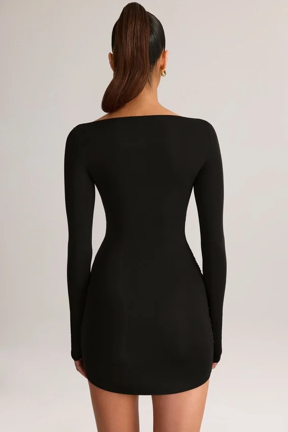 Vestido corto de manga larga con cuello barco y drapeado de modal Eska en negro Vestido corto de manga larga con cuello barco y drapeado de modal Eska en negro
