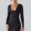Vestido corto de manga larga con escote pronunciado de jersey elástico Oakley en negro