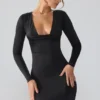 Vestido corto de manga larga con escote pronunciado de jersey elástico Oakley en negro