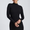 Vestido corto de manga larga con espalda abierta Yara Modal en negro Vestido corto de manga larga con espalda abierta Yara Modal en negro
