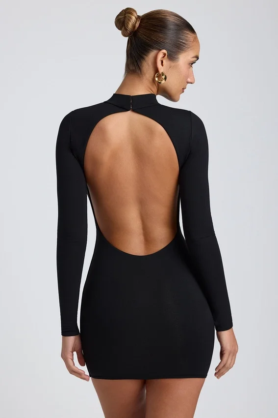 Vestido corto de manga larga con espalda abierta Yara Modal en negro Vestido corto de manga larga con espalda abierta Yara Modal en negro