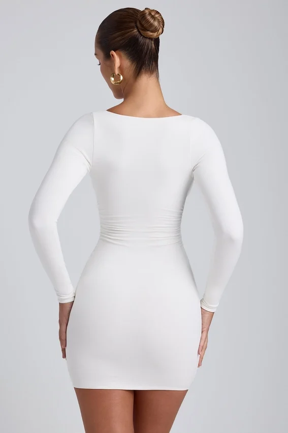 Vestido corto de manga larga con fruncidos de modal Sana en blanco Vestido corto de manga larga con fruncidos de modal Sana en blanco