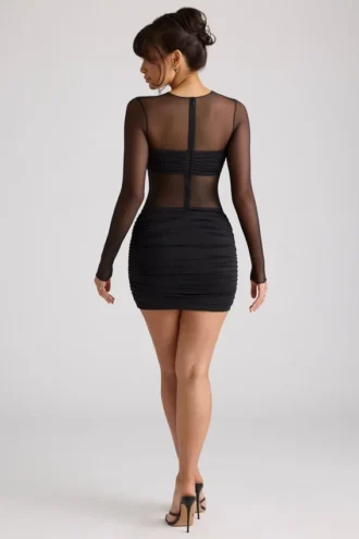 Vestido corto de manga larga con paneles transparentes Essie en negro