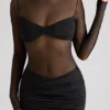 Vestido corto de manga larga con paneles transparentes Essie en negro