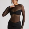 Vestido corto de manga larga con paneles transparentes Essie en negro