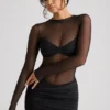 Vestido corto de manga larga con paneles transparentes Essie en negro