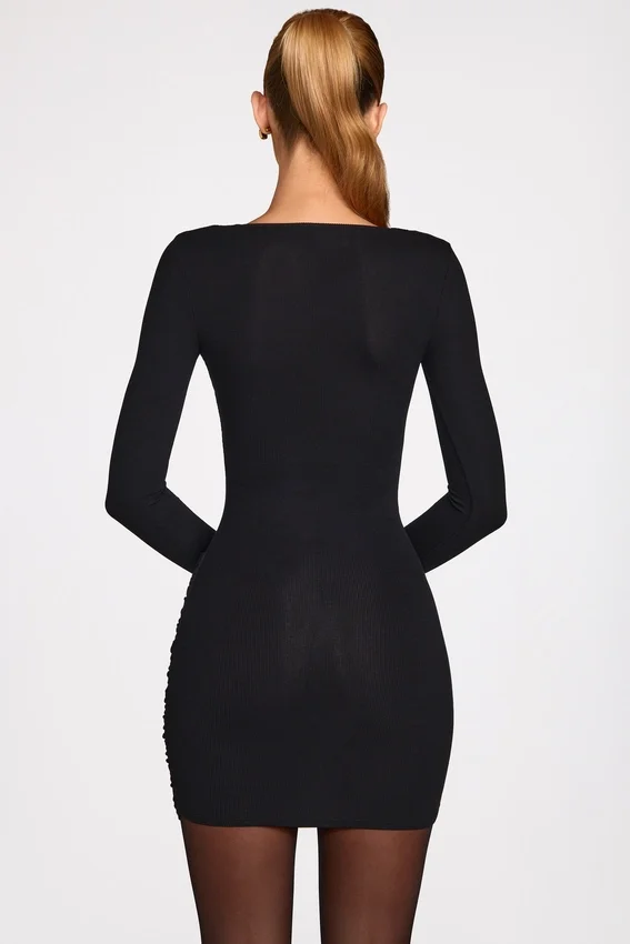 Vestido corto drapeado de manga larga con canalé de modal Elona en negro Vestido corto drapeado de manga larga con canalé de modal Elona en negro