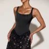 Vestido corto Eira con corsé de satén y falda adornada en negro y morado Vestido corto Eira con corsé de satén y falda adornada en negro y morado