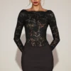 Vestido corto Eirlys de encaje transparente con cuello barco en negro Vestido corto Eirlys de encaje transparente con cuello barco en negro