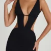 Vestido corto Gaia con corte en A y aberturas en negro Vestido corto Gaia con corte en A y aberturas en negro
