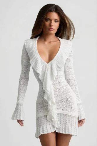 Vestido corto Jolessa de punto pointelle con volantes en blanco