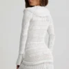 Vestido corto Jolessa de punto pointelle con volantes en blanco