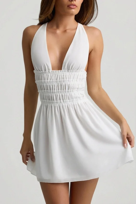 Vestido corto Kaelis con escote pronunciado y espalda cruzada en blanco Vestido corto Kaelis con escote pronunciado y espalda cruzada en blanco