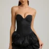 Vestido corto Laela de satén con bajo abullonado y corsé en negro