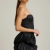 Vestido corto Laela de satén con bajo abullonado y corsé en negro