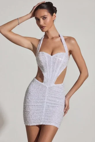 Vestido corto Lucia con escote halter y aberturas decoradas en blanco