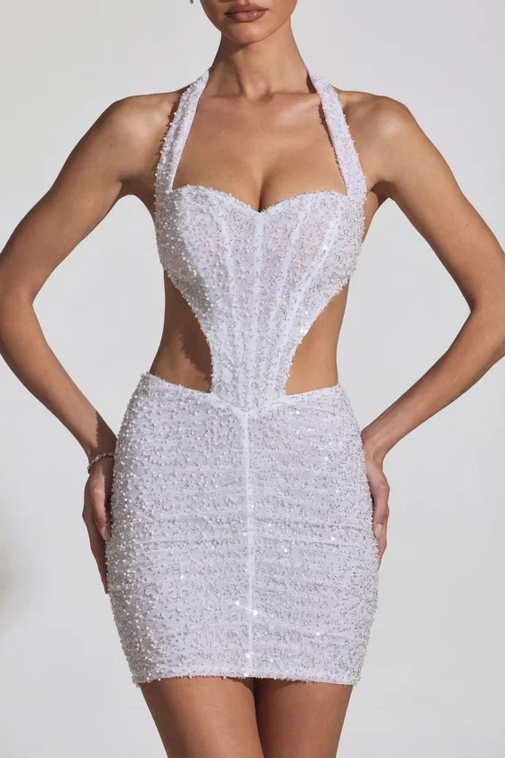 Vestido corto Lucia con escote halter y aberturas decoradas en blanco Vestido corto Lucia con escote halter y aberturas decoradas en blanco