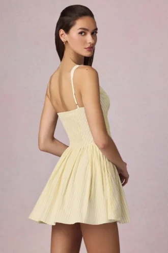 Vestido corto Marissa con detalle de lazo y corte en A en rayas amarillo limón