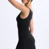 Vestido corto micro con fruncidos y corte en A de modal Ione en negro Vestido corto micro con fruncidos y corte en A de modal Ione en negro