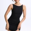 Vestido corto micro con fruncidos y corte en A de modal Ione en negro Vestido corto micro con fruncidos y corte en A de modal Ione en negro