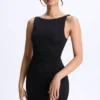 Vestido corto micro con fruncidos y corte en A de modal Ione en negro Vestido corto micro con fruncidos y corte en A de modal Ione en negro