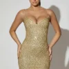 Vestido corto Mischa con cuello corazón y adornos en dorado Vestido corto Mischa con cuello corazón y adornos en dorado