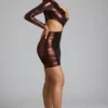Vestido corto Nasira de jersey metalizado con aberturas en color bronce cobrizo Vestido corto Nasira de jersey metalizado con aberturas en color bronce cobrizo