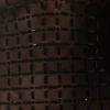 Vestido corto negro semitransparente con aberturas y adornos Ilana