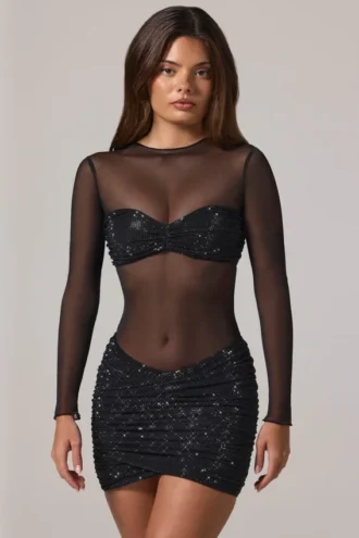 Vestido corto Noel de manga larga con cuello alto y adornos transparentes en negro