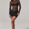 Vestido corto Noel de manga larga con cuello alto y adornos transparentes en negro Vestido corto Noel de manga larga con cuello alto y adornos transparentes en negro