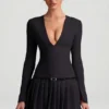 Vestido corto plisado de manga larga Fiorella en negro