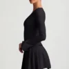Vestido corto plisado de manga larga Fiorella en negro
