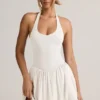 Vestido corto Reanna de modal con espalda descubierta y cuello halter en blanco