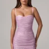 Vestido corto rosa con fruncidos y aberturas decoradas Neréa