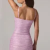 Vestido corto rosa con fruncidos y aberturas decoradas Neréa