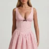 Vestido corto Sabina con detalle de lazo y corte en A en lunares rosa