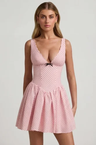 Vestido corto Sabina con detalle de lazo y corte en A en lunares rosa