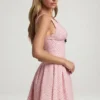 Vestido corto Sabina con detalle de lazo y corte en A en lunares rosa