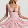Vestido corto Sabina con detalle de lazo y corte en A en lunares rosa