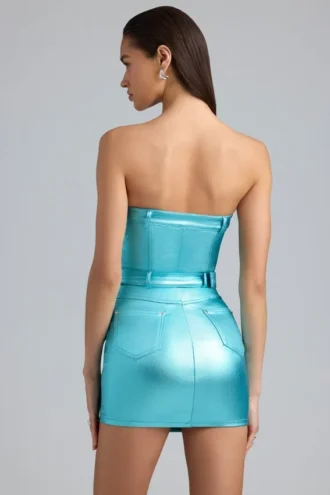 Vestido corto sin tirantes con cinturón de denim metalizado Simone en color aguamarina