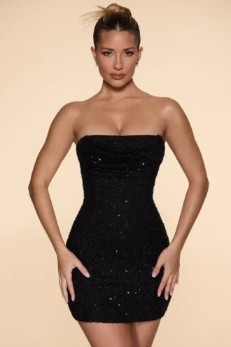 Vestido corto sin tirantes con cuello vuelto y adornos Basel en negro
