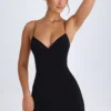 Vestido corto Tesni con cuello halter y tirantes en negro