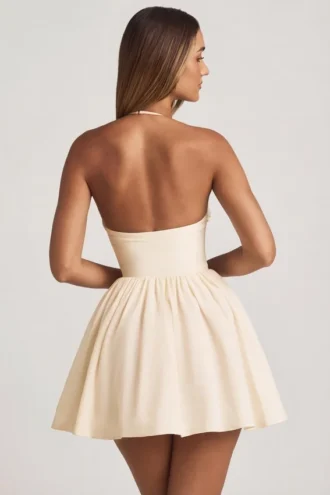 Vestido corto tipo corsé con apliques florales y cuello halter Augusta en color marfil