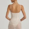 Vestido corto tipo corsé drapeado con adornos semitransparentes Connie en blanco