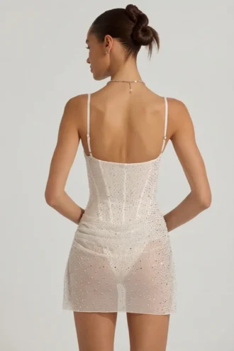 Vestido corto tipo corsé drapeado con adornos semitransparentes Connie en blanco
