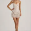 Vestido corto tipo corsé drapeado con adornos semitransparentes Connie en blanco