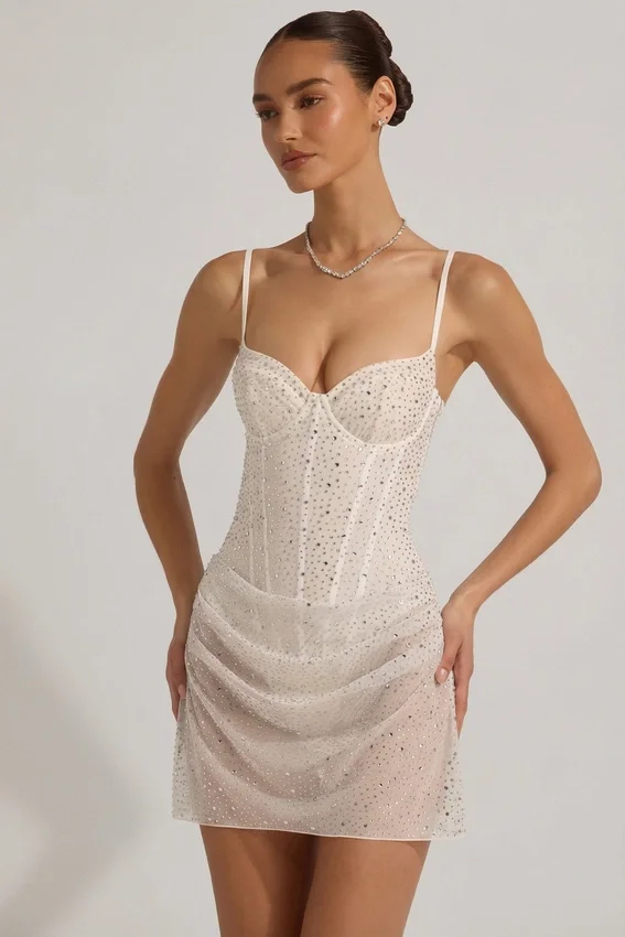 Vestido corto tipo corsé drapeado con adornos semitransparentes Connie en blanco