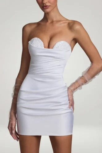 Vestido corto Tirza con fruncidos y corsé en blanco